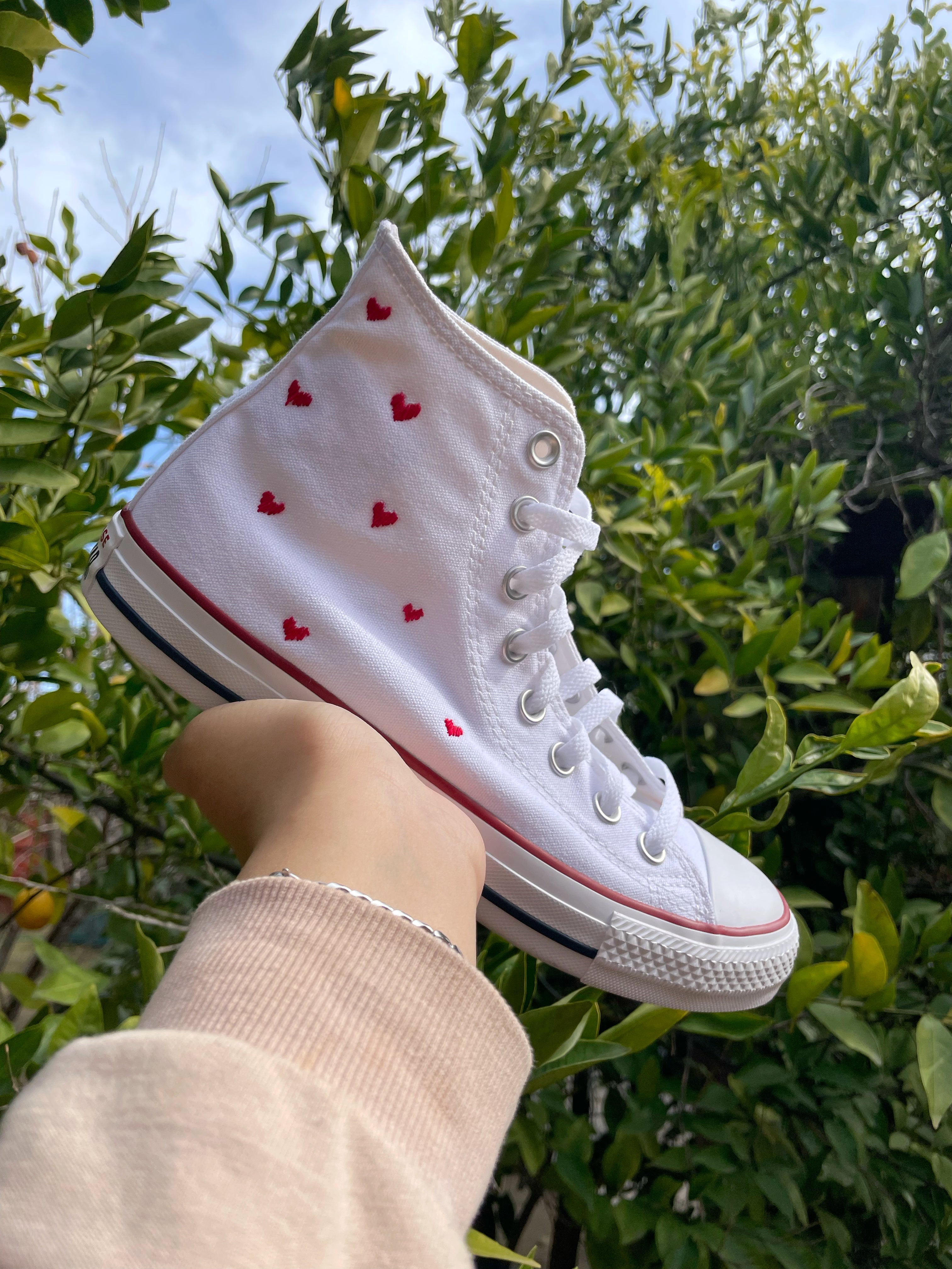 Chucks with hearts store on them